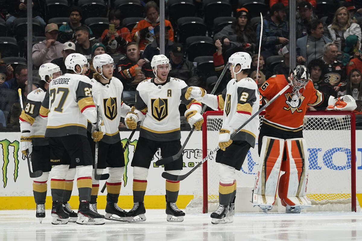 The Vegas Golden Knights celebrate after center Jonathan Marchessault (81) scored during the se ...