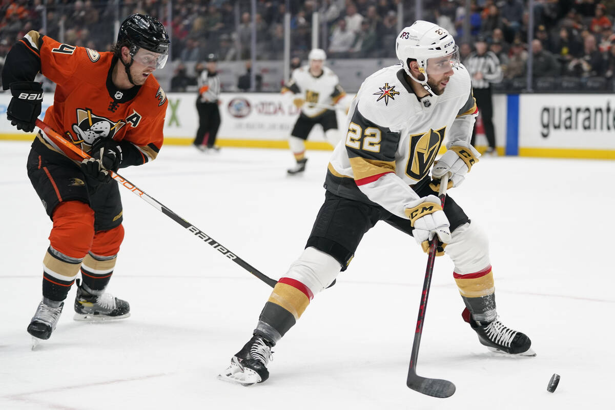Vegas Golden Knights center Michael Amadio (22) controls the puck against Anaheim Ducks defense ...