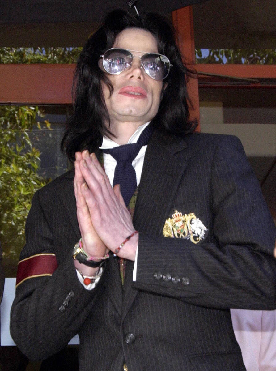 Pop star Michael Jackson leaves Santa Barbara County Superior Court in Santa Maria, Calif., Thu ...