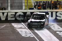 Chandler Smith (18) crosses the finish line in first place to win the NASCAR Camping World Truc ...