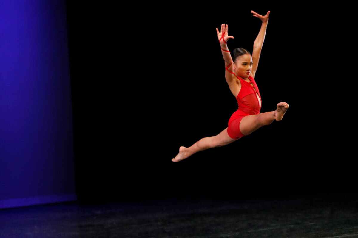 Gabby Peralta (10) competes in the Pre-Competitive Contemporary Competition Group 1 women ages ...