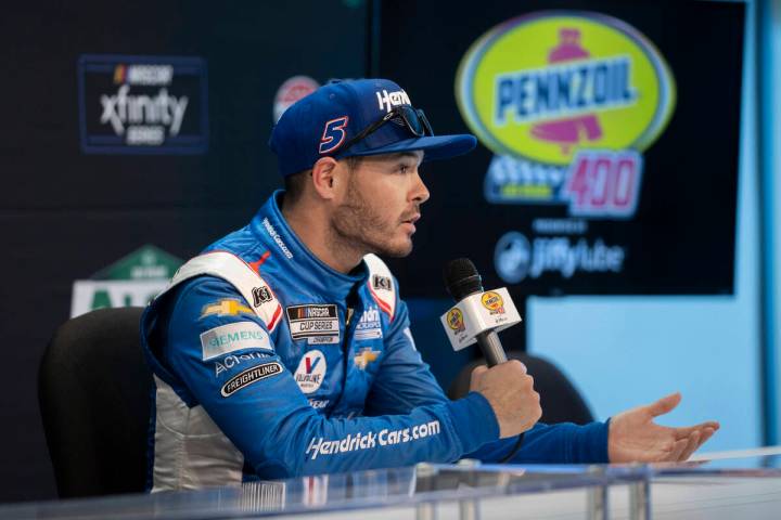 Cup Series driver Kyle Larson (5) speaks to the media after qualifying for the Pennzoil 400 on ...
