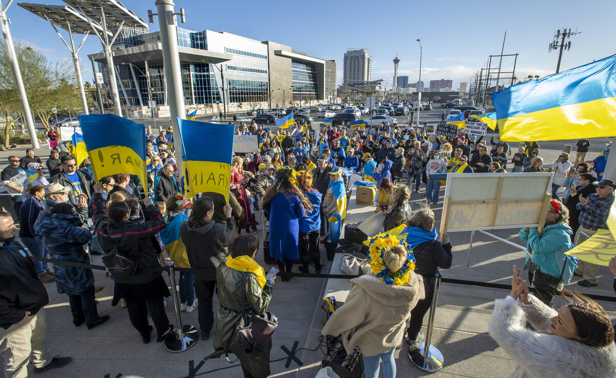 Speeches continue as a large crowd grows during a Rally for Ukraine at City Hall on Saturday, M ...