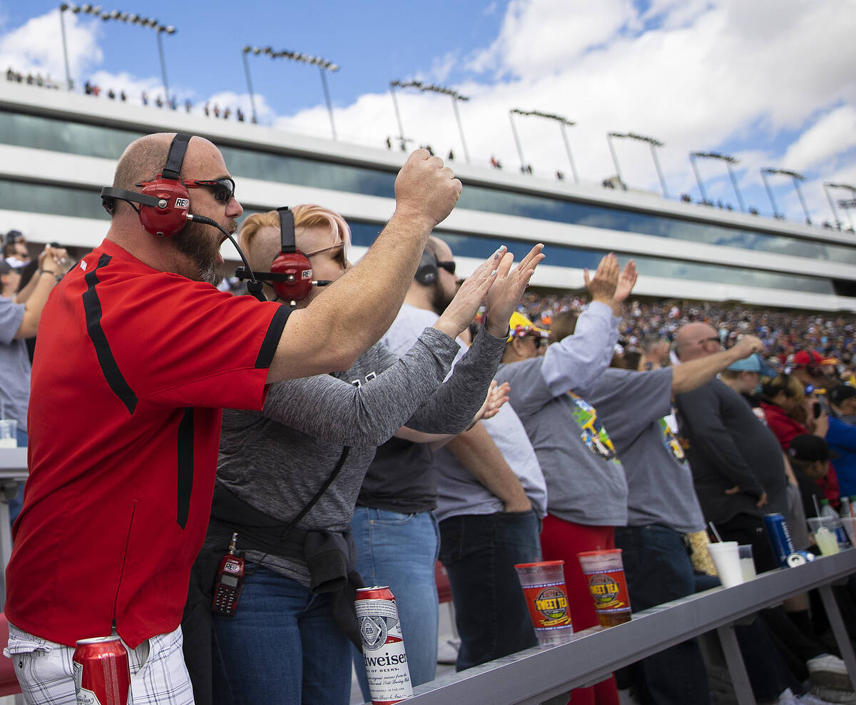 Fans cheer during the Pennzoil 400 NASCAR Cup Series race on Sunday, March 6, 2022, at Las Vega ...