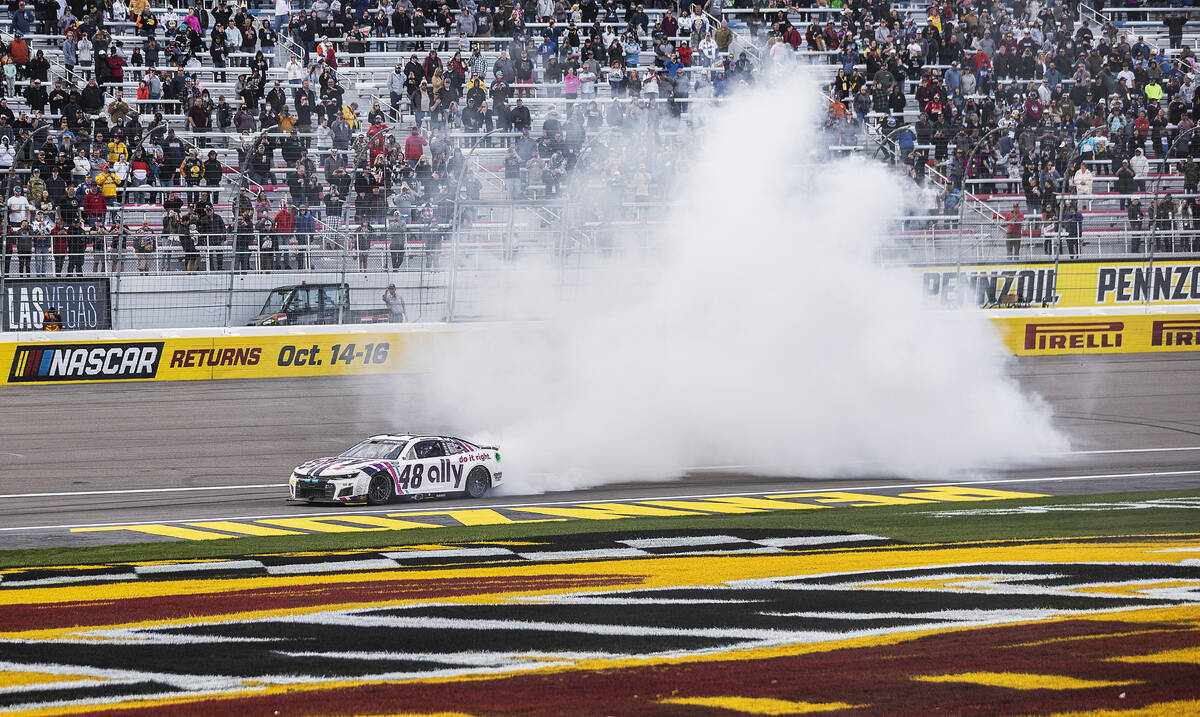 NASCAR Cup Series driver Alex Bowman (48) celebrates with a burn out after winning the Pennzoil ...
