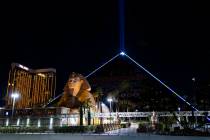 The Luxor illuminates with yellow and blue colors in support of Ukraine on Sunday, March 6, 202 ...