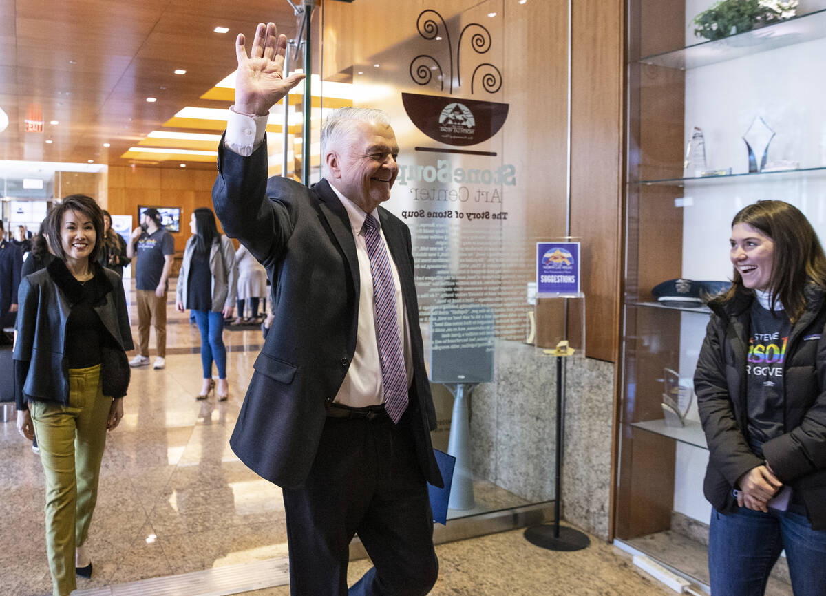Gov. Steve Sisolak acknowledges his supporter after formally filing for re-election, which mark ...