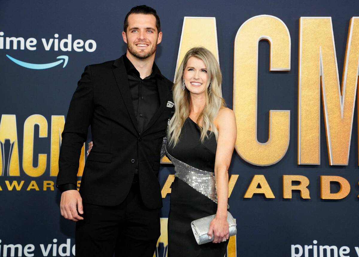 Derek Carr of the Los Vegas Raiders, and Heather Neel arrive at the 57th Academy of Country Mus ...
