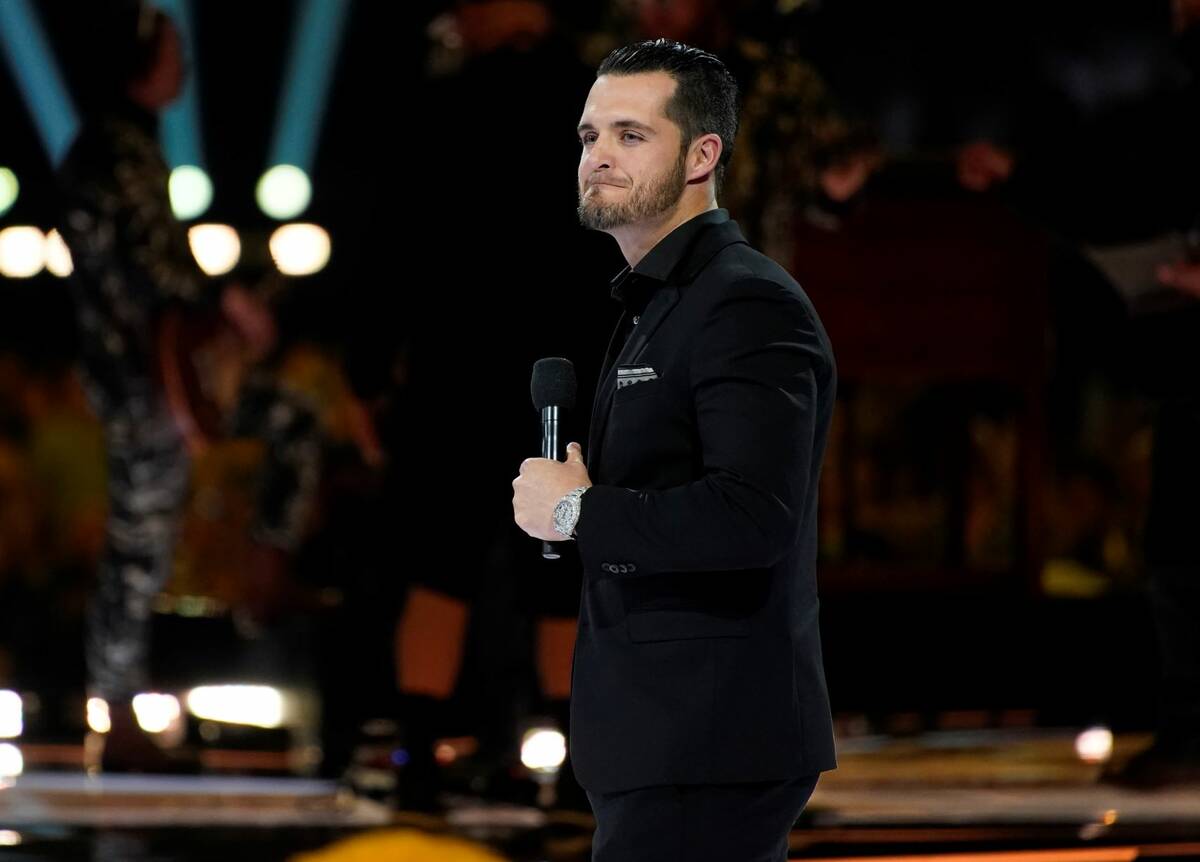 Derek Carr presents the award for album of the year at the 57th Academy of Country Music Awards ...