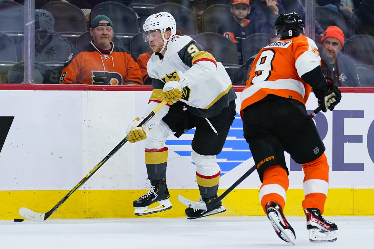 Vegas Golden Knights' Jack Eichel, left, skates past Philadelphia Flyers' Ivan Provorov during ...