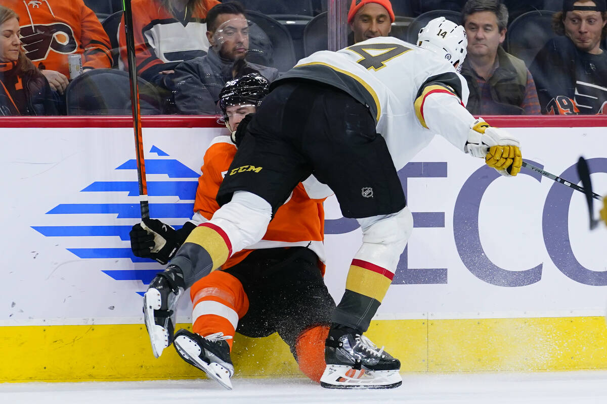 Philadelphia Flyers' Joel Farabee, left, and Vegas Golden Knights' Nicolas Hague collide during ...