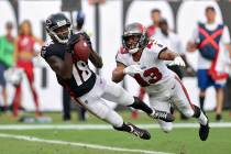 FILE - Atlanta Falcons wide receiver Calvin Ridley (18) makes a diving touchdown reception in f ...