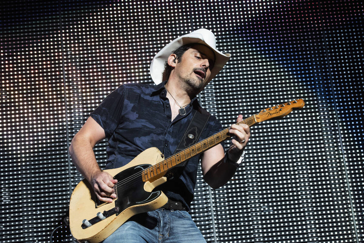 Brad Paisley performs on stage at Ameris Bank Amphitheatre, Friday, Aug. 23, 2019, in Alpharett ...