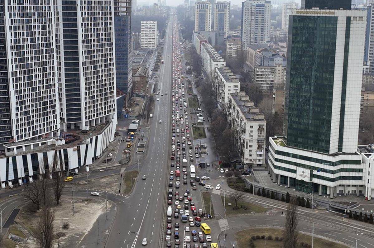 Traffic jams are seen as people leave the city of Kyiv, Ukraine, Thursday, Feb. 24, 2022. Russi ...
