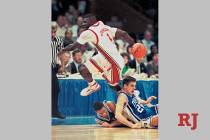 UNLV forward Larry Johnson does a behind the back pass during the NCAA Men's basketball champi ...