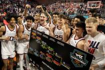 Gonzaga players celebrate after beating St. Mary’s to win the West Coast Conference tour ...