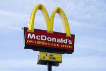 A sign is displayed outside a McDonald's restaurant in April 2021 in Des Moines, Iowa. (AP Pho ...