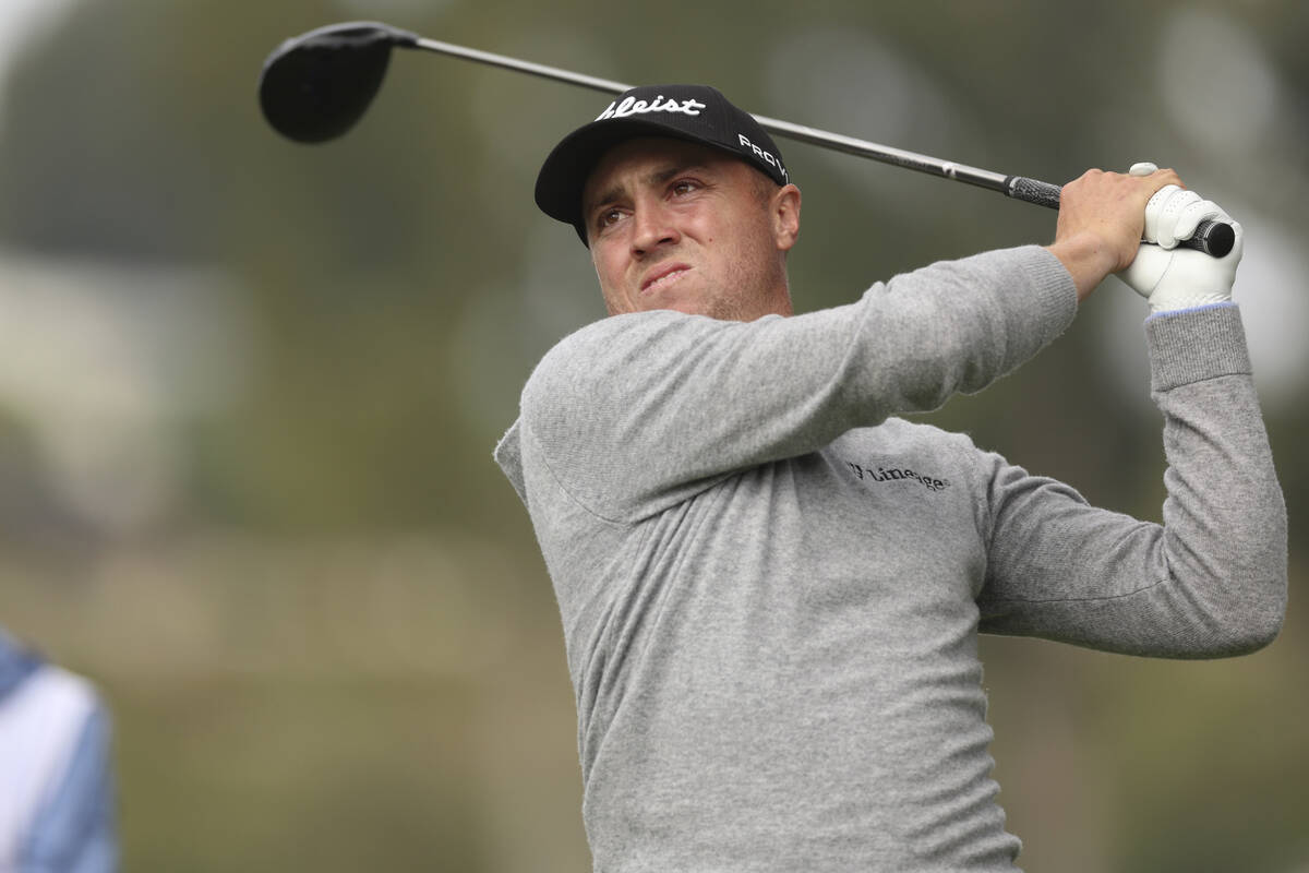 FILE - Justin Thomas tees off on the 15th hole during the final round of the Genesis Invitation ...