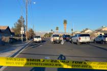 Las Vegas police investigate a fatal crash at the intersection of Gowan and Walnut roads in the ...