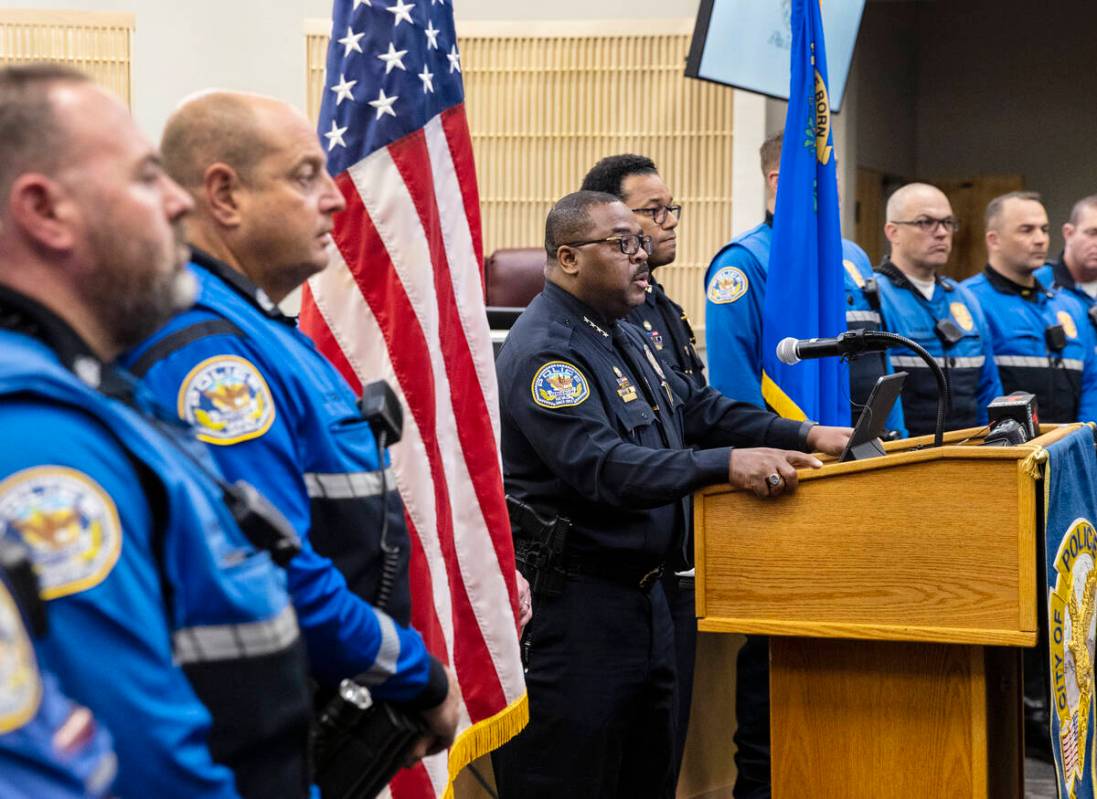 Henderson Police Department Chief Thedrick Andres, center, speaks about recent fatal crashes in ...