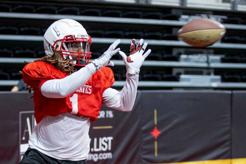 Knight Hawks wide receiver Traveon Samuel looks to make a catch during open practice at the Dol ...