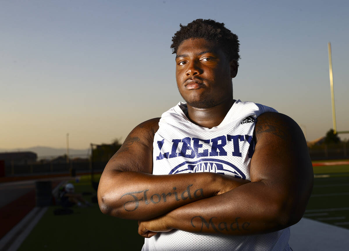 Liberty's Sir Mells poses for a portrait during football practice in Henderson on Monday, Aug. ...