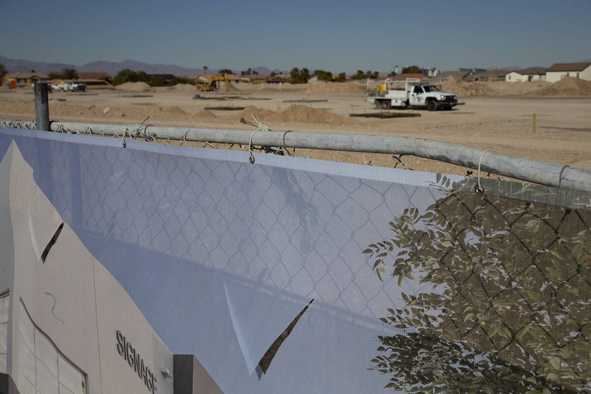 Signage at a construction site where Canadian developer Beedie is underway on a two-building in ...