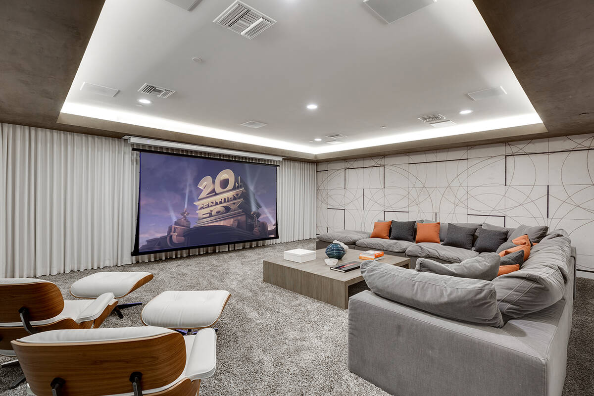 The home on Soaring Bird Court in The Ridges in Summerlin features a large home theater. (Ivan ...