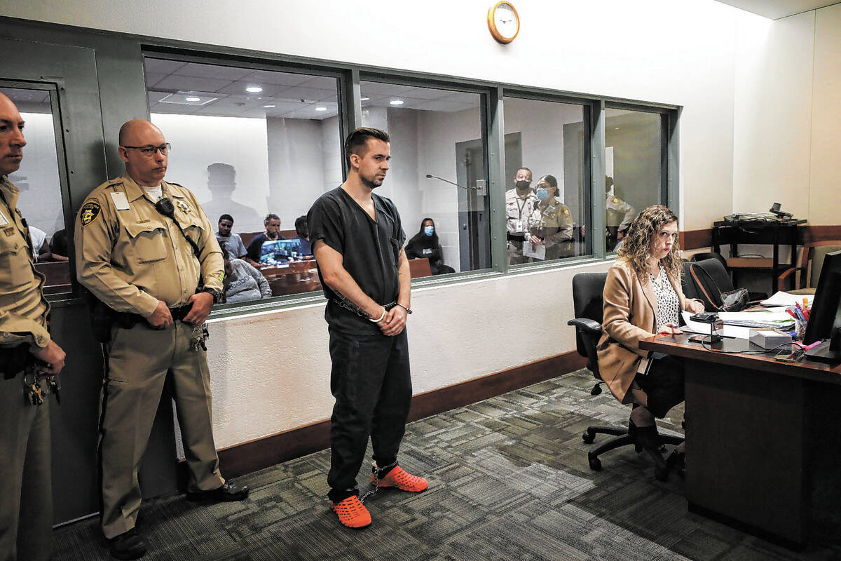 Caleb Rogers, a Las Vegas police officer who is being charged for robbing a casino, at his init ...