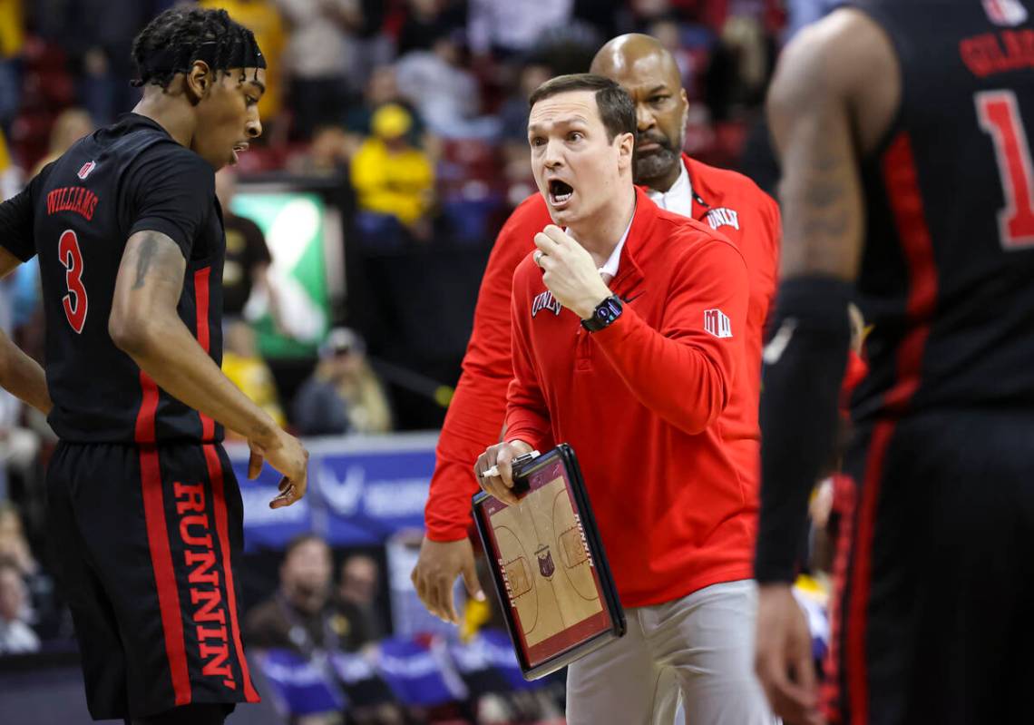 UNLV Rebels head coach Kevin Kruger talks with his team during the second half of a Mountain We ...