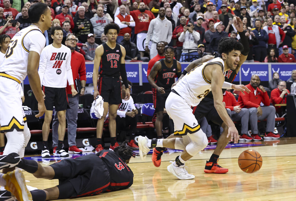Wyoming Cowboys guard Hunter Maldonado (24) grabs a rebound against the UNLV Rebels in the fina ...