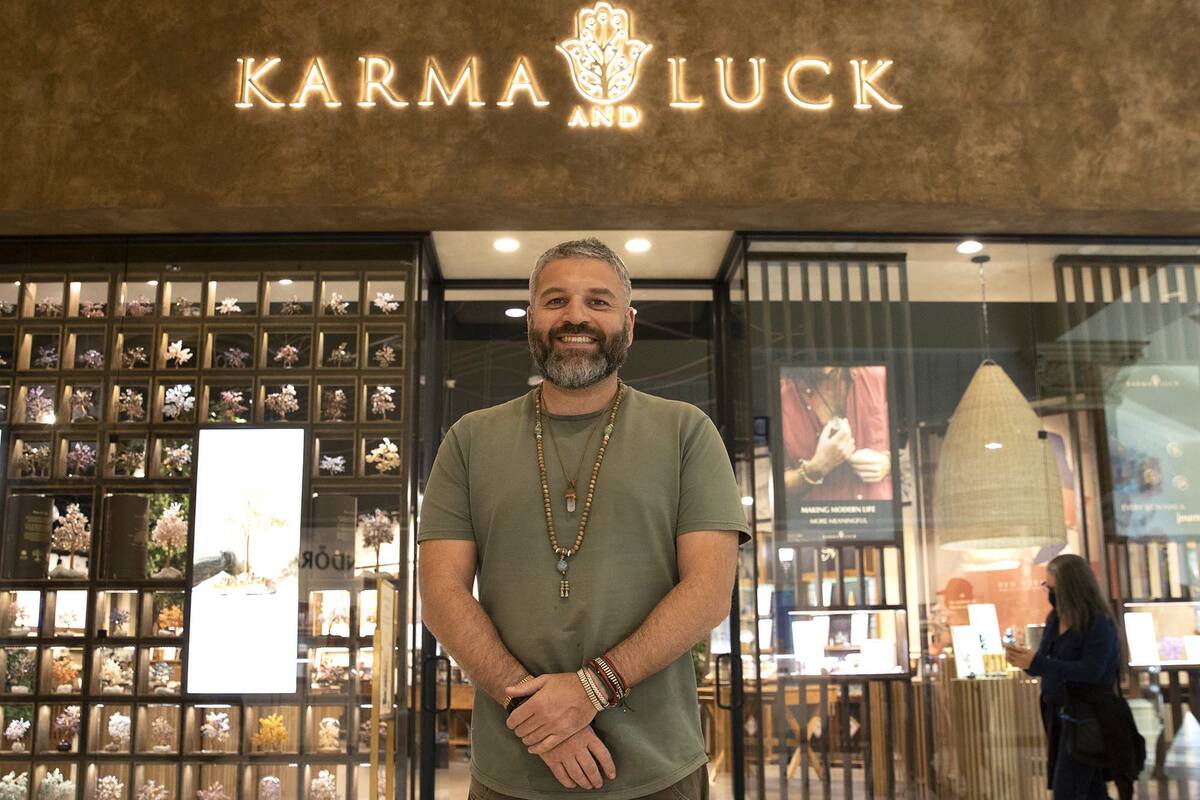 Vladi Bergman, founder and CEO of Karma and Luck poses for a photo outside of his retail store ...