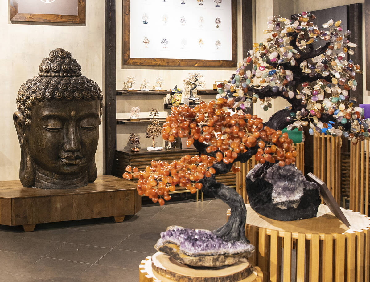 Handmade trees, known as Feng Shui Tree of Life, are displayed at Karma and Luck retail store o ...