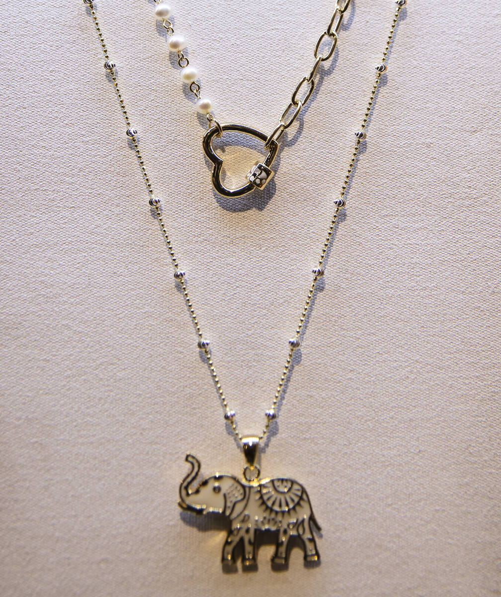 Necklaces are displayed at Karma and Luck retail store on Thursday Feb. 10, 2022, in Las Vegas. ...