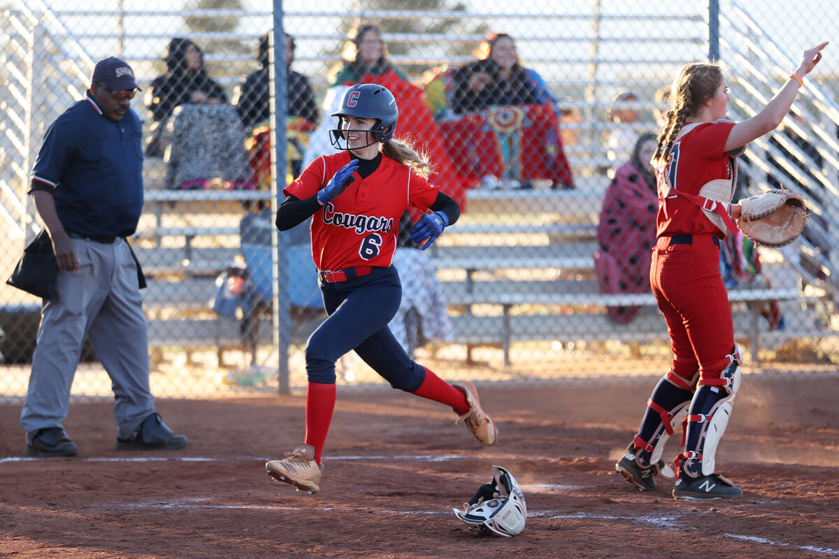 Coronado’s Mary Lou Tsunis (6) runs home for a score against Liberty during a softball g ...