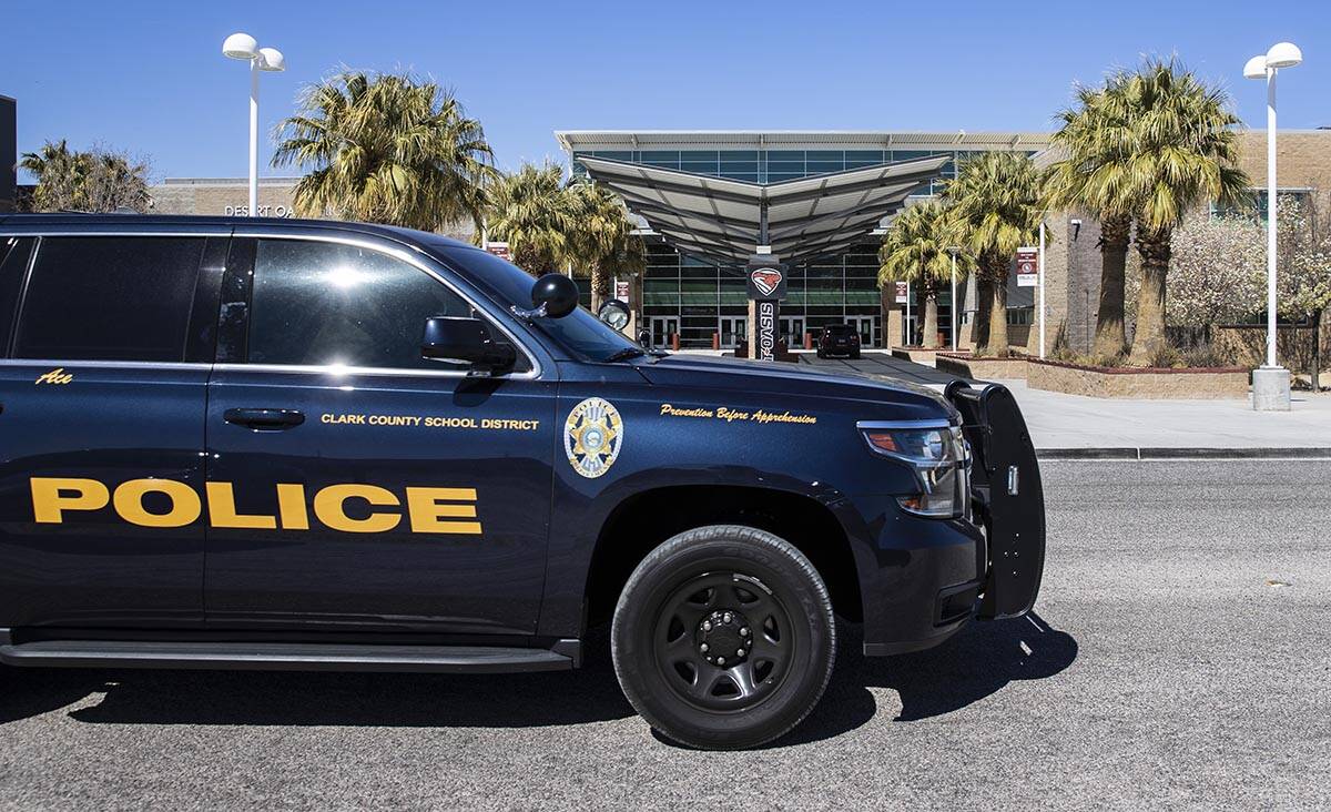 The Clark County School District police vehicle is seen outside of Desert Oasis High School on ...