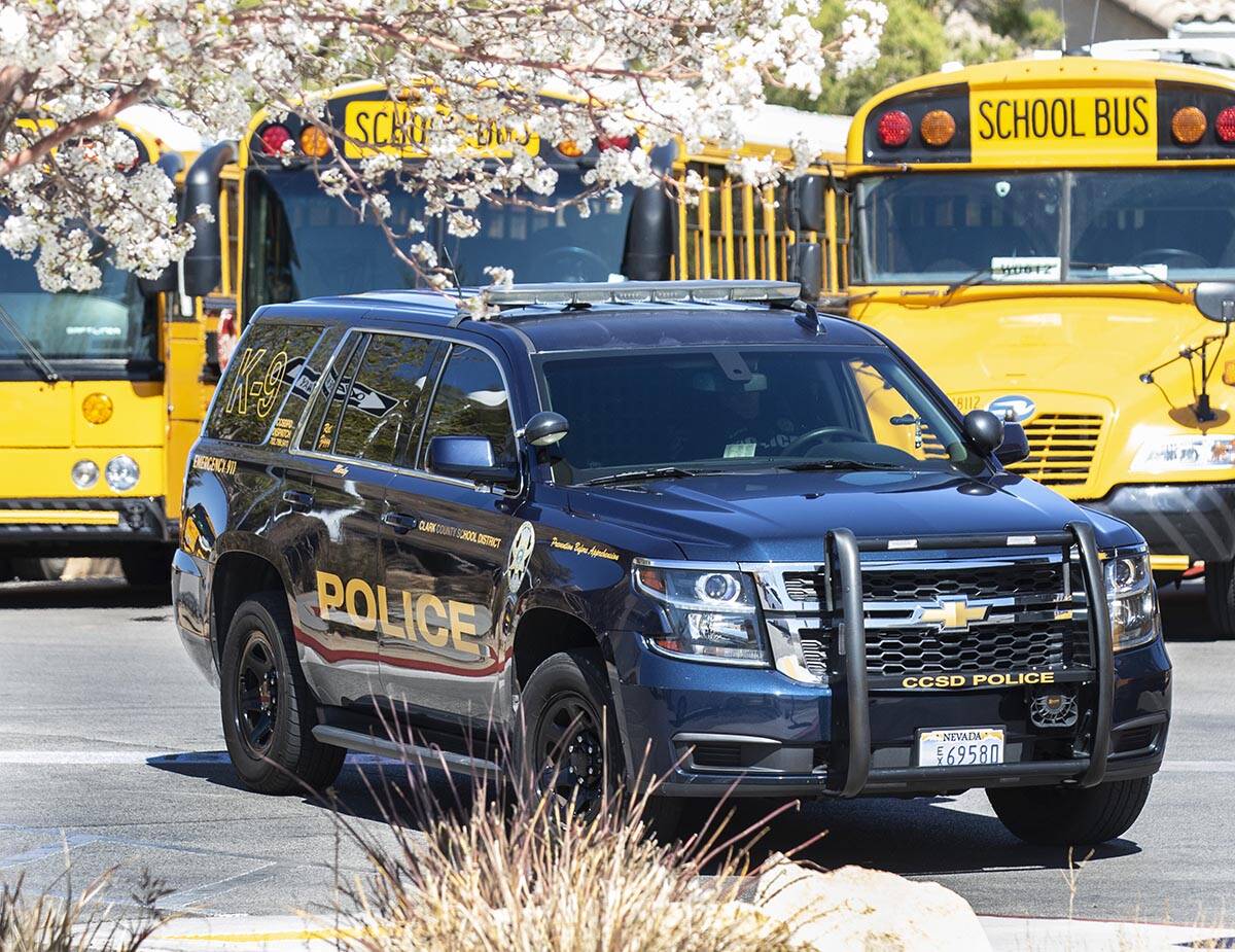 The Clark County School district police vehicle is seen outside of Desert Oasis High School on ...