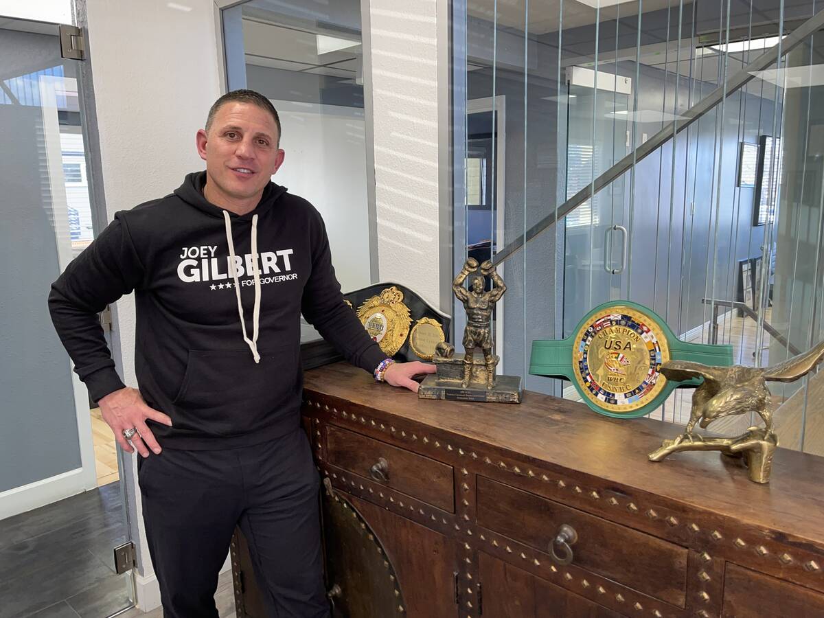 Joey Gilbert, Reno attorney and Republican candidate for governor, stands next to his boxing tr ...