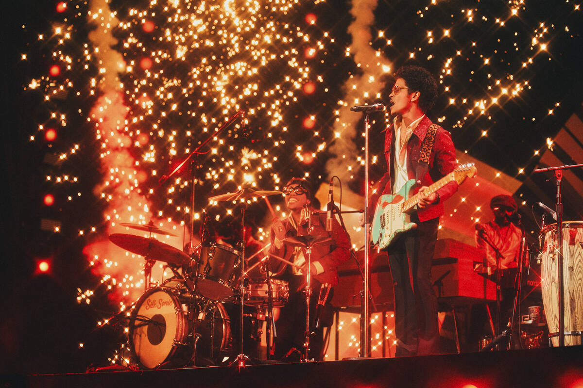 Bruno Mars and Anderson .Paak are shown in their Silk Sonic residency production at Dolby Live ...