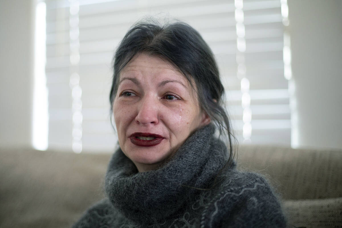 Mihaela Steyer cries while reliving memories of her late son, Louis, at her home in Las Vegas. ...