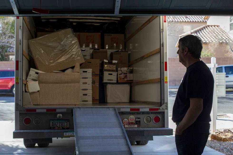 Tom Steyer pauses while moving the last boxes from the home where his 16-year-old son, Louis, d ...