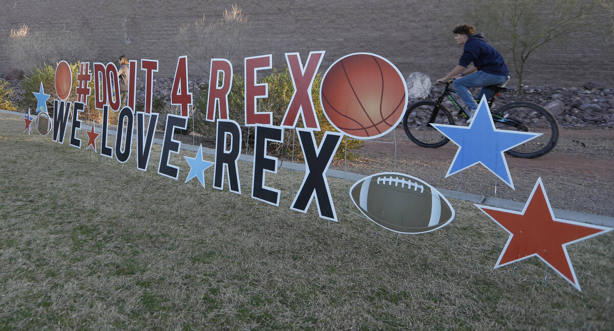 A sign for Rex Patchett is seen, Friday, March 11, 2022, during a remembrance ceremony for Pat ...