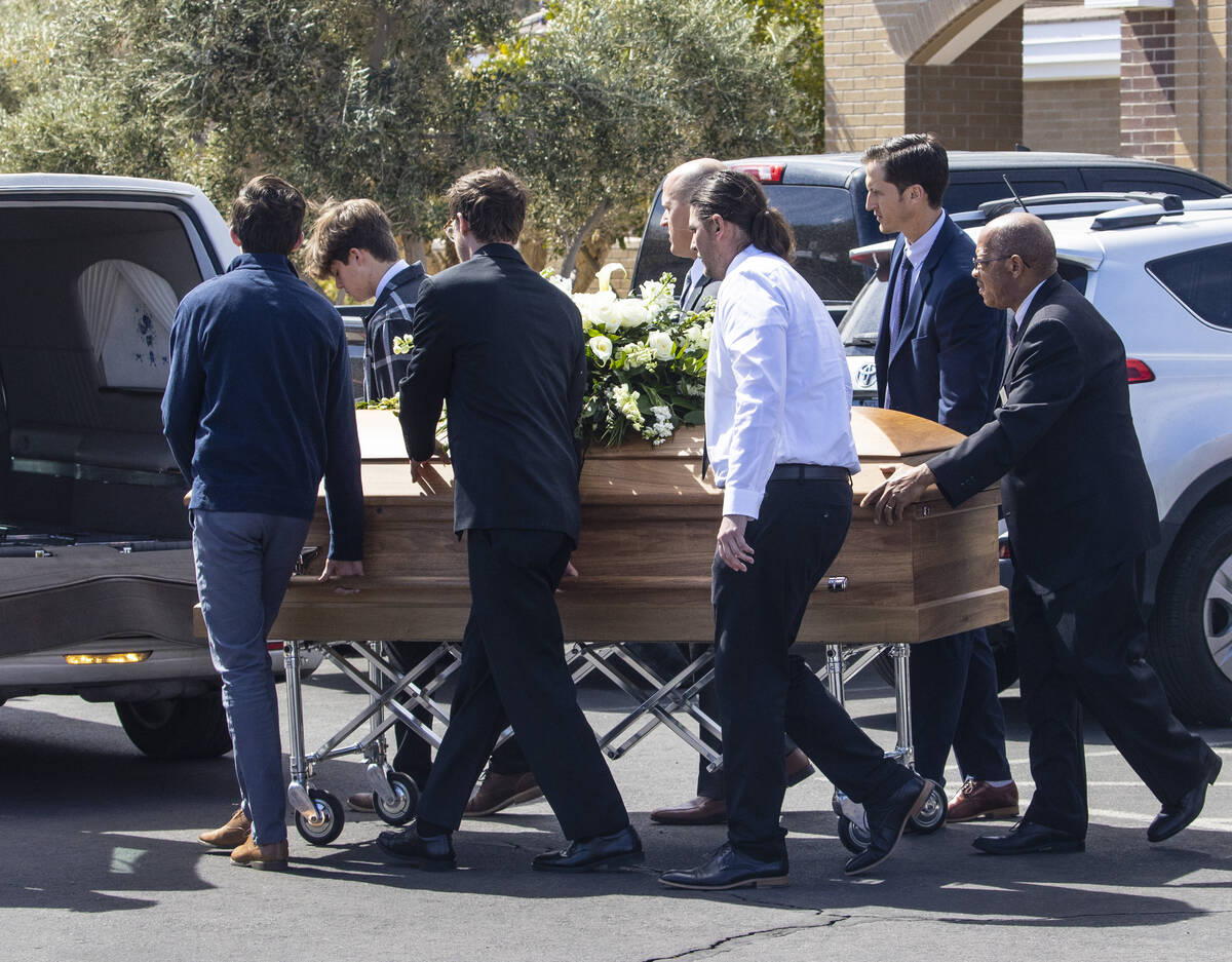 Pallbearers load the casket of Rex Patchett, 13, outside Church of Jesus Christ of Latter-day S ...