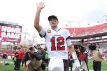Tampa Bay Buccaneers quarterback Tom Brady (12) waves to the fans after the team defeated the P ...
