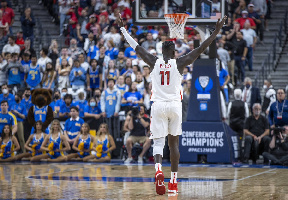 Arizona Wildcats center Oumar Ballo (11) celebrates their win over the UCLA Bruins 84-76 follow ...