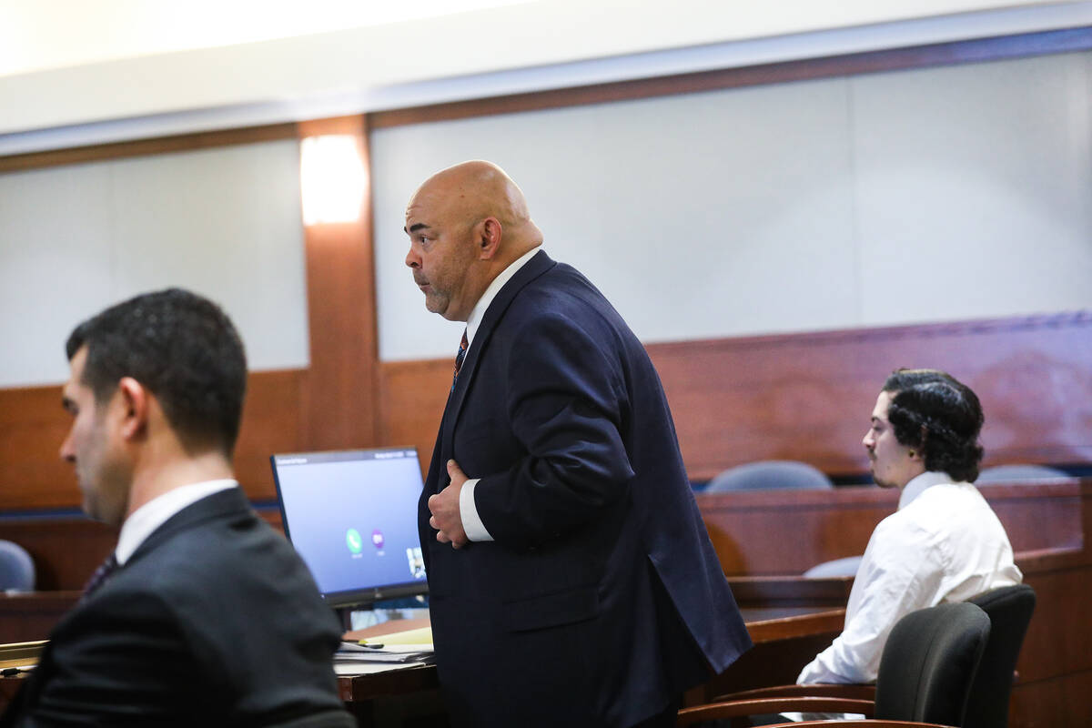Defense attorney Erick Ferran asks questions of a witness at a preliminary hearing for his clie ...