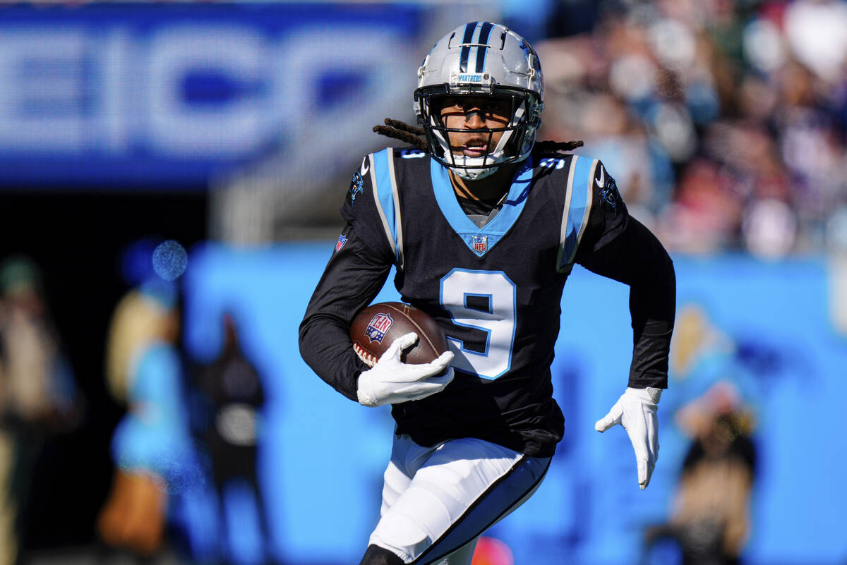 FILE - Carolina Panthers' Stephon Gilmore returns an interception against the New England Patri ...