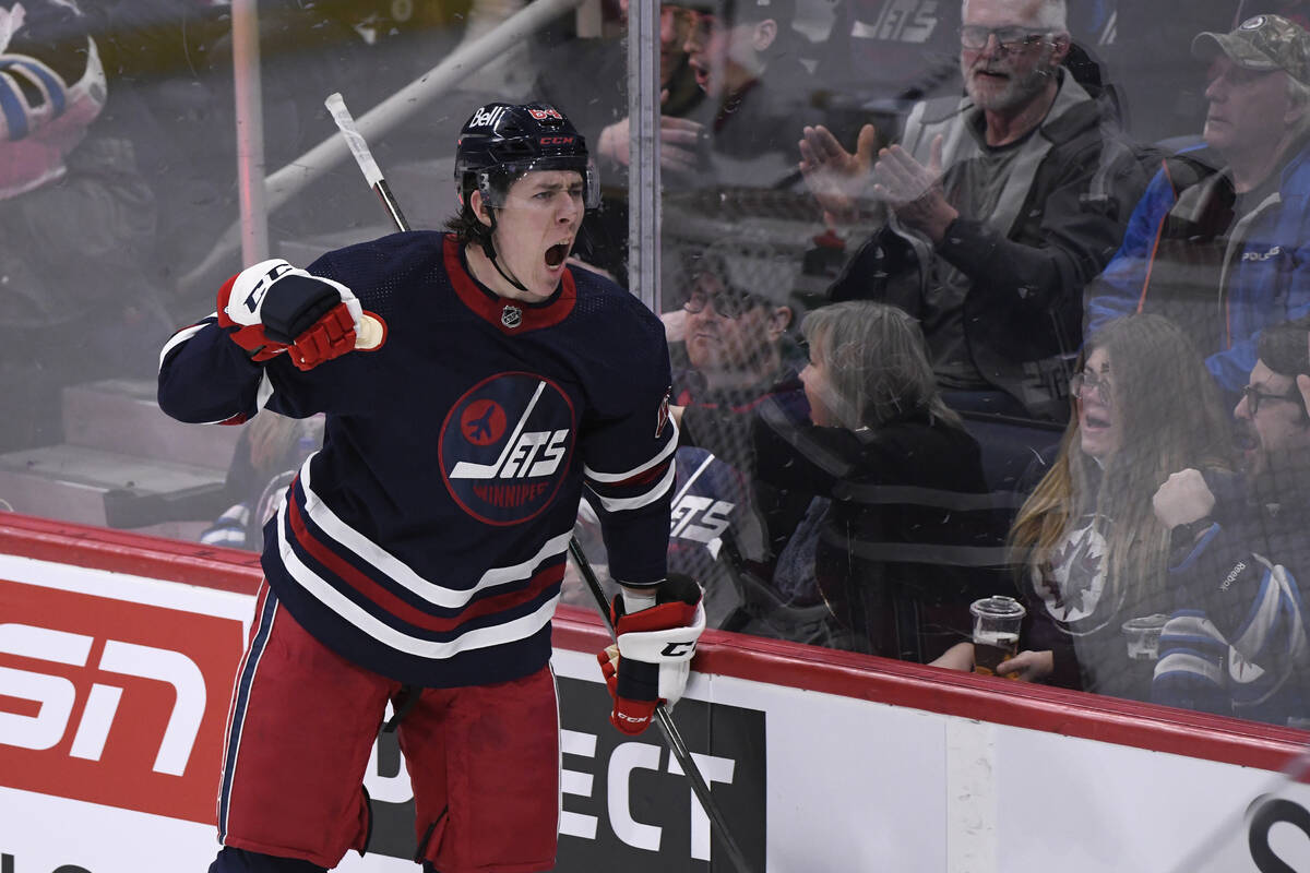 Winnipeg Jets' Logan Stanley (64) celebrates his goal against the Vegas Golden Knights during t ...