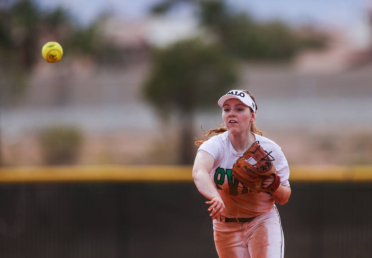 Palo Verde’s Mya Bartlett (18) makes a throw to first during a girls high school softbal ...