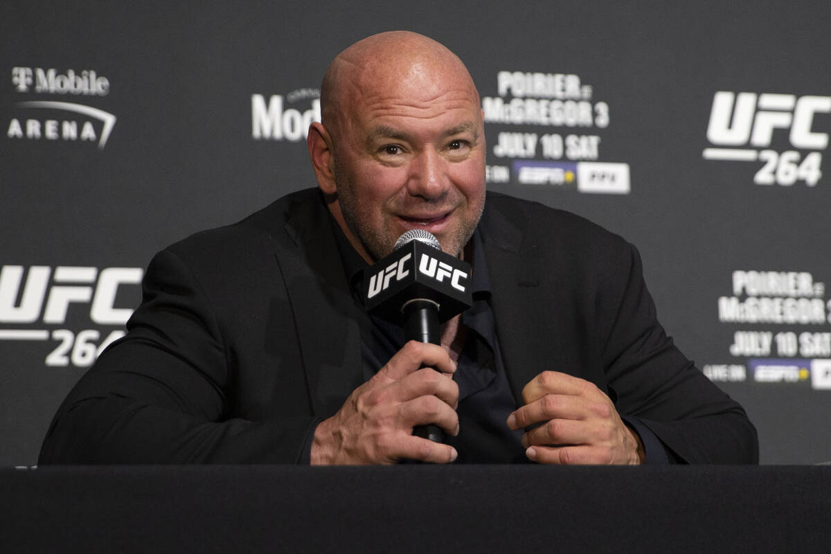 UFC president Dana White answers questions during a post-fight news conference at UFC 264 at th ...